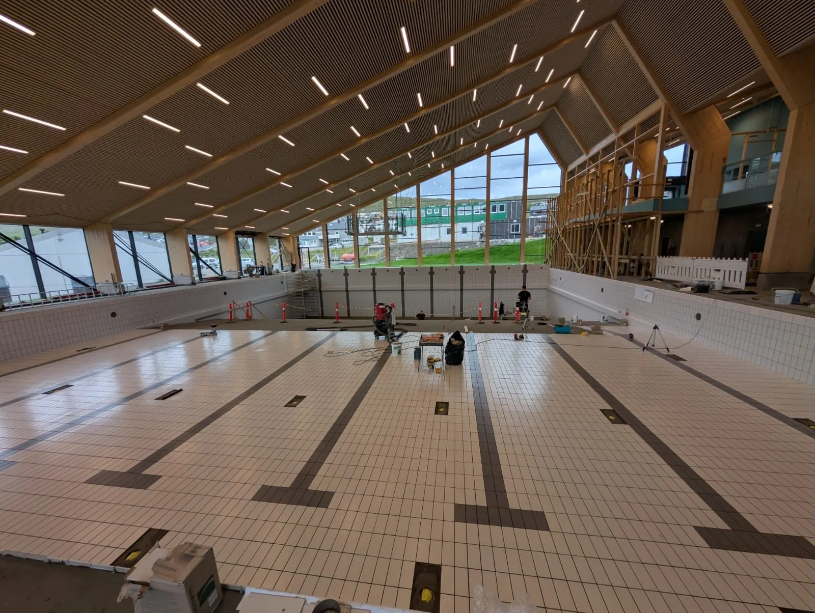 The Bylgjan swimming hall in Runavík under construction, tiled main pool
